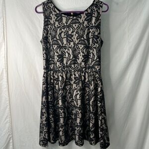 Black, lacy, mini dress in excellent condition